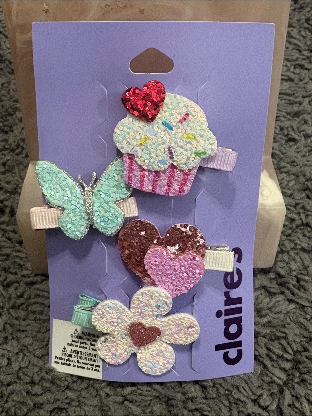 NWT Claire’s set of 4 hair clips - cupcake, butterfly, hearts, & a flower